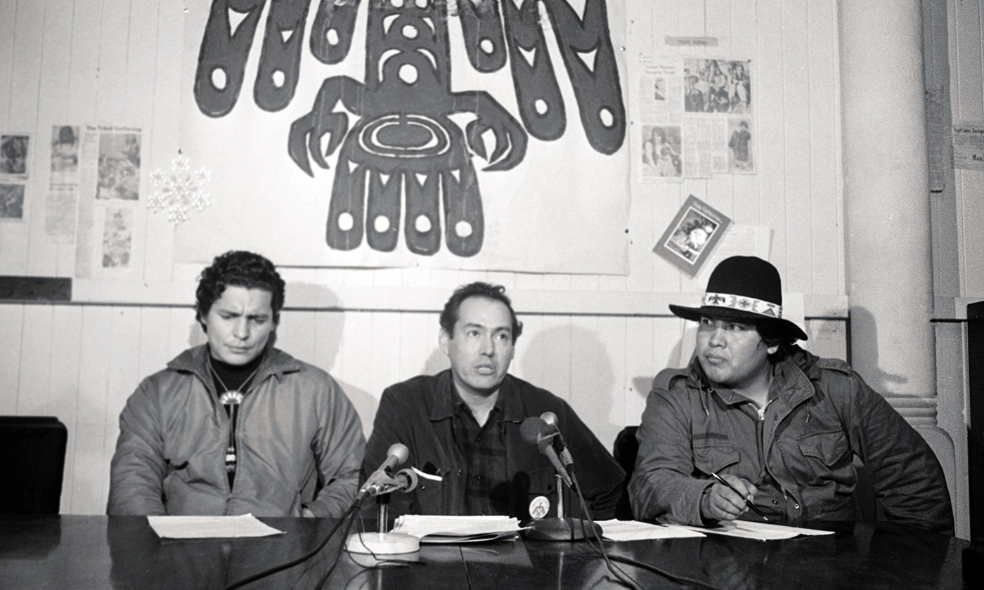 Left to right, Richard Oakes, Earl Livermore, and Al Miller, leaders of the American Indian Movement hold a press conference at Alcatraz Federal Penitentiary on December 24, 1969, during their takeover in 1969-70.