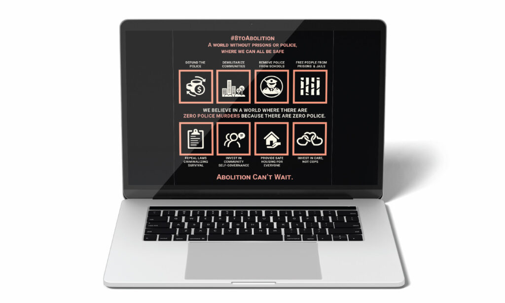 A laptop computer displays the viral social media graphic created by "8 to Abolition" that identifies the steps toward "A world without prisons or police."