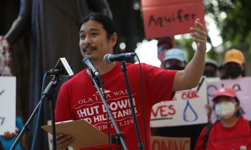 Mikey Inouye, O’ahu Water Protector and co-founder of Shutdown Red Hill Mutual Aid, speaking to hundreds at a demonstration at the State Capitol.