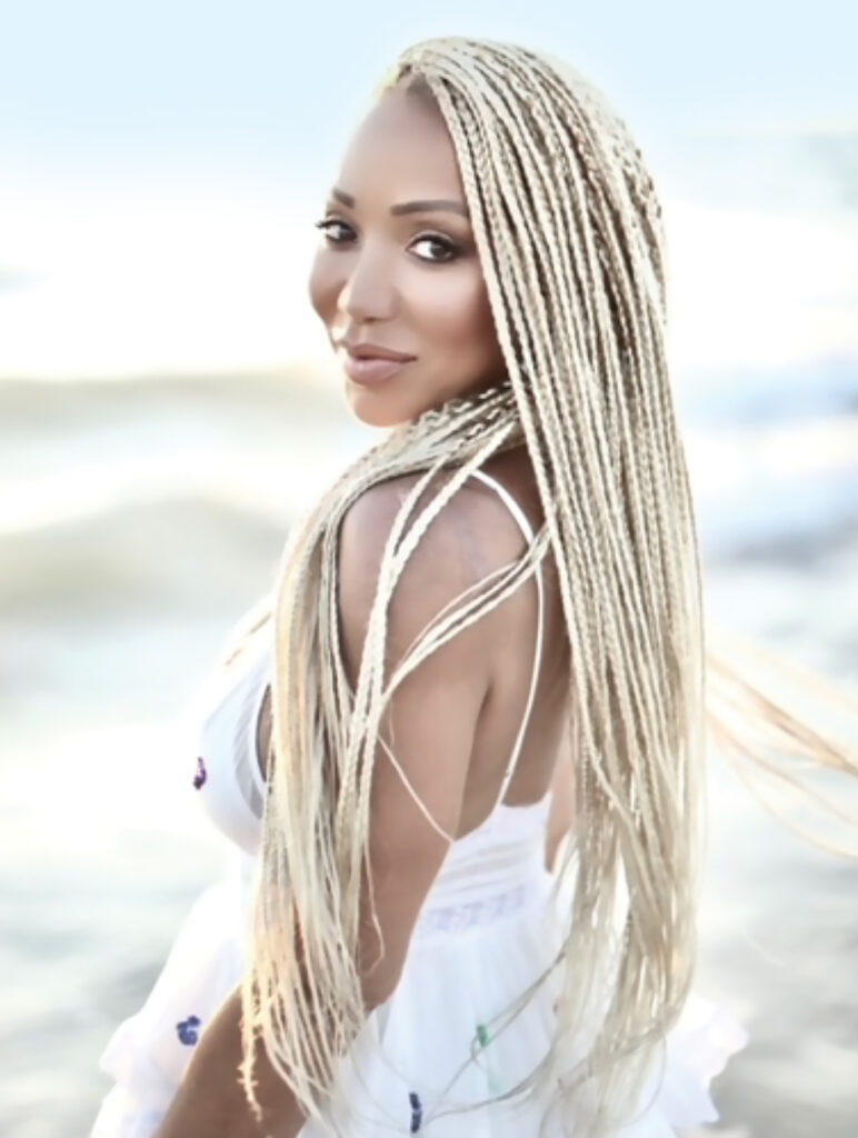 Meredith Harper Houston, a light-skinned woman with blond braids