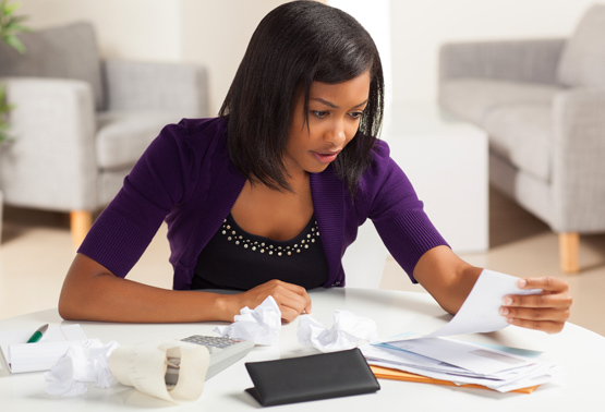 Woman doing bills.