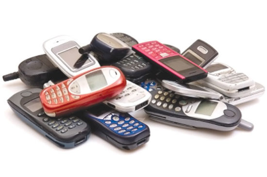 Cell Phone Pile by Shutterstock