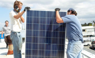 Installing photovoltaics by Everybody Solar.