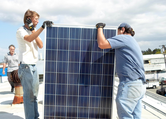 Installing photovoltaics by Everybody Solar.