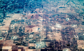 West Texas fracking wells. Photo by Dennis Dimick