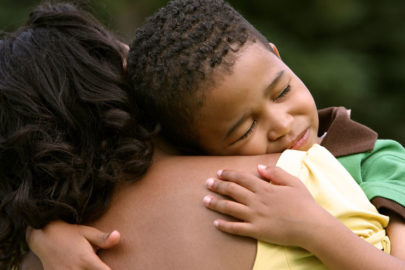Boy Hugging Mother photo by Studio 1One/Shutterstock