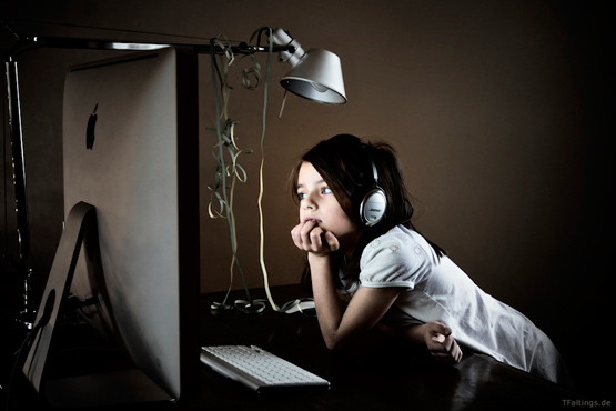 Kid using a computer.