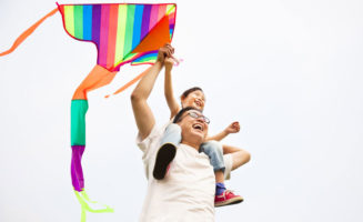 Father and daughter with kite photo from Shutterstock