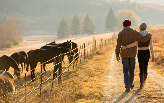 Couple walking by Shutterstock