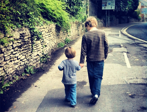 Boys Holding Hands photo by Kate Hisock