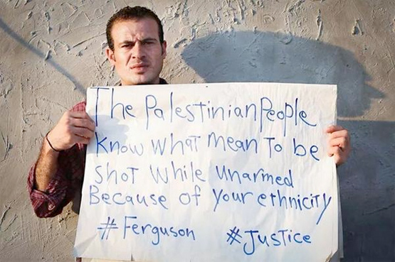 Palestinian in support of Ferguson protestors.