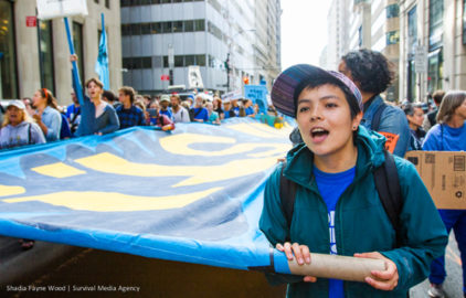The author marches in the Flood Wall Street demonstration. Photo by Shadia Fayne-Wood / Project Survival Media.