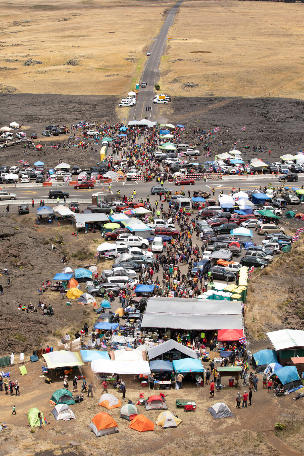 <p>An aerial view of the growing numbers of protesters opposing the telescope project. Photo from Pu'uhonua o Pu'uhuluhulu.</p>