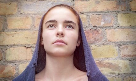 Girl in Hood photo by Armin Staudt