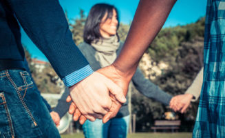 Holding Hands photo from Shutterstock