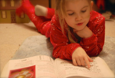 Learning to Read. Photo by The Real Estreya/ Flickr.