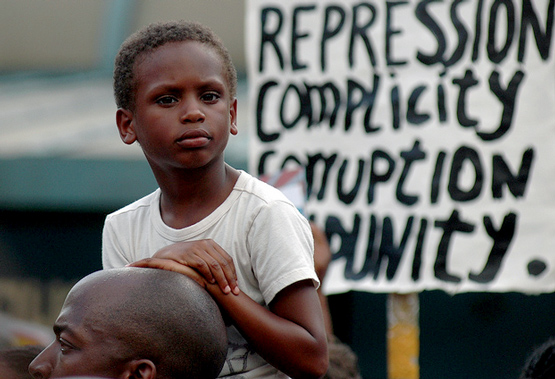 Boy at demonstration for Trayvon Martin