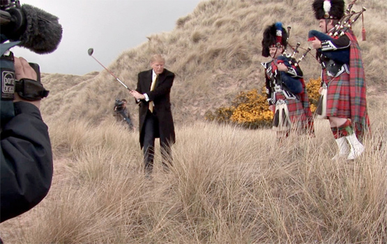 Donald Trump golfs