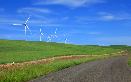 Windmills with blue sky.